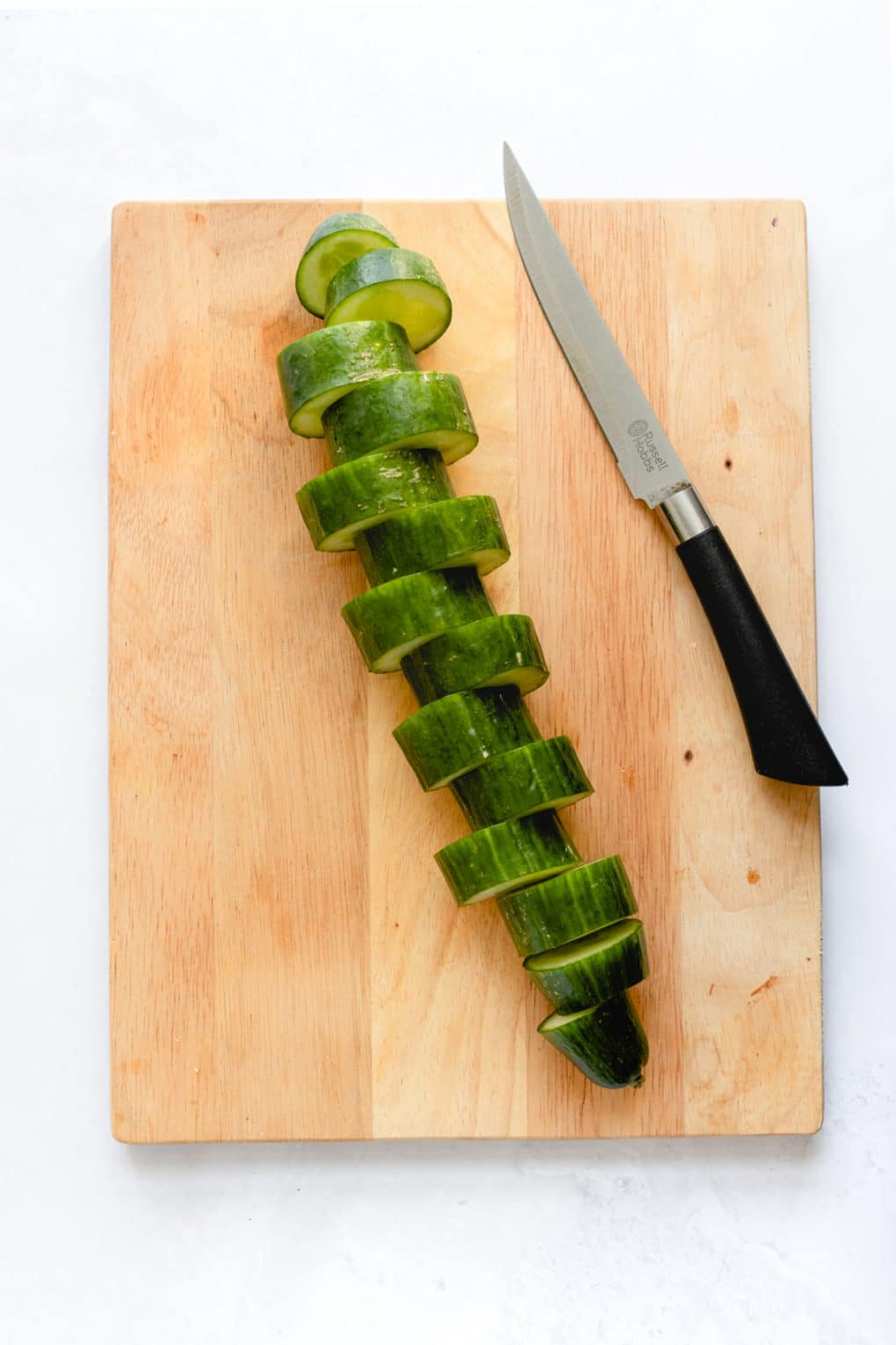 a sliced cucumber for cucumber tuna cups