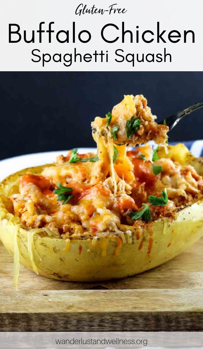 someone lifting a fork out of a buffalo chicken spaghetti squash