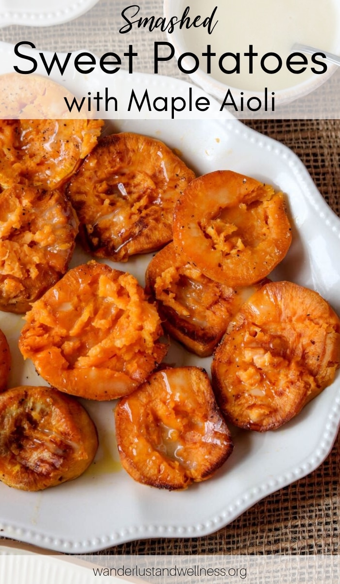 a white platter of smashed sweet potatoes with maple aioli