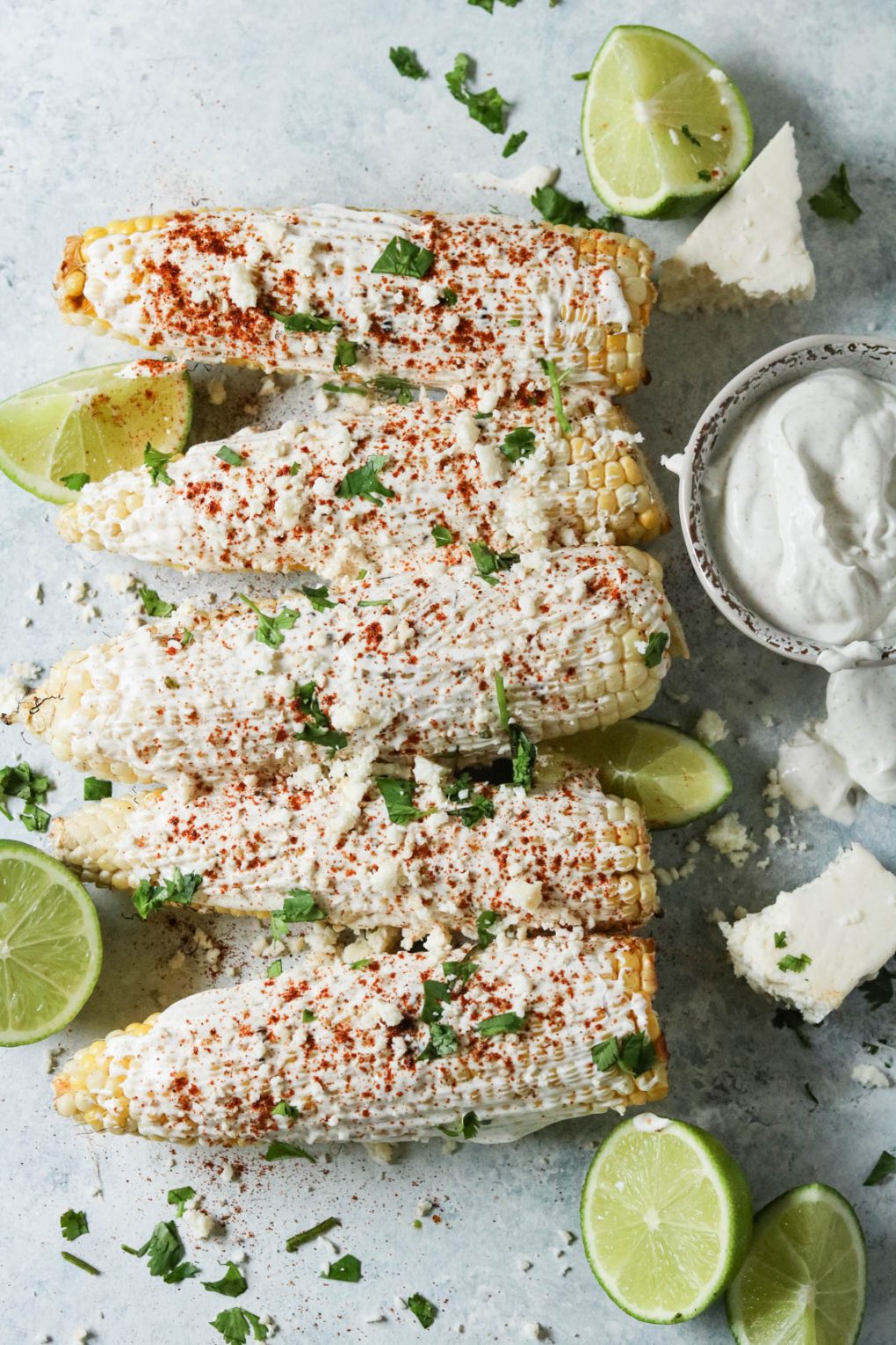 five ears of grilled Mexican street corn