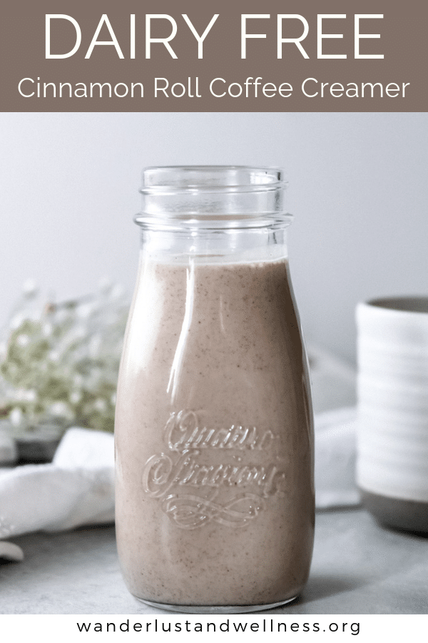 a milk jar with dairy free cinnamon roll coffee creamer