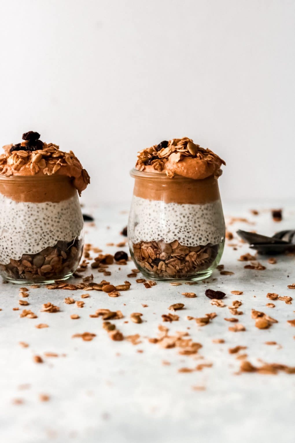 two small glass jars of pumpkin pie chia pudding