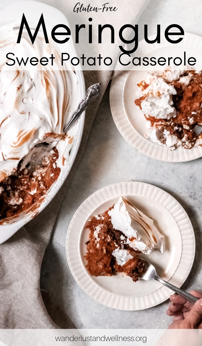 two servings of meringue-topped sweet potato casserole on small white plates and a women's hand holding a fork