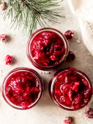 3 small Weck jelly jars filled with orange cranberry relish