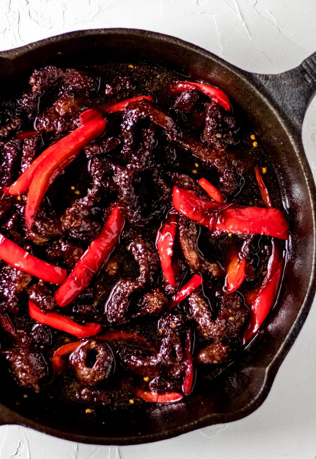 a skillet of air fryer sticky asian beef