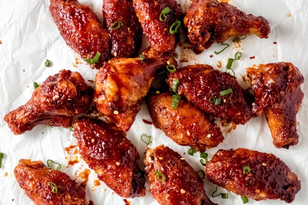 a pile of barbecue chicken wings