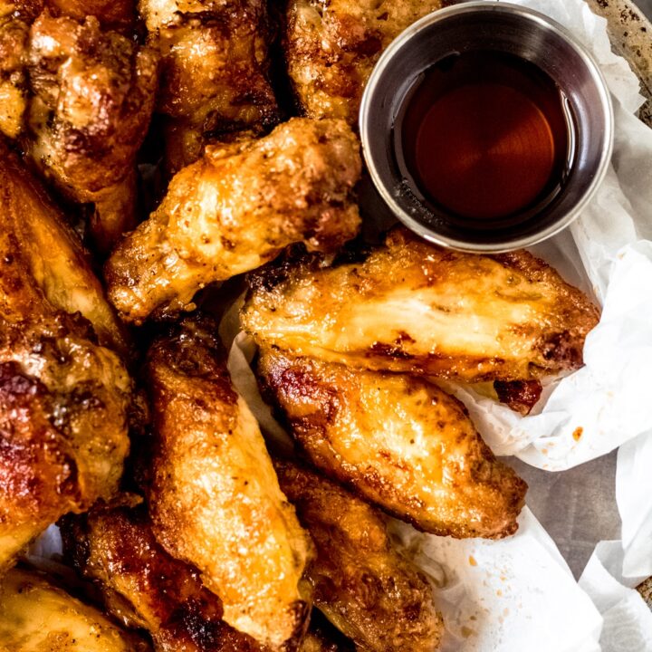 a bowl of chicken wings with maple syrup