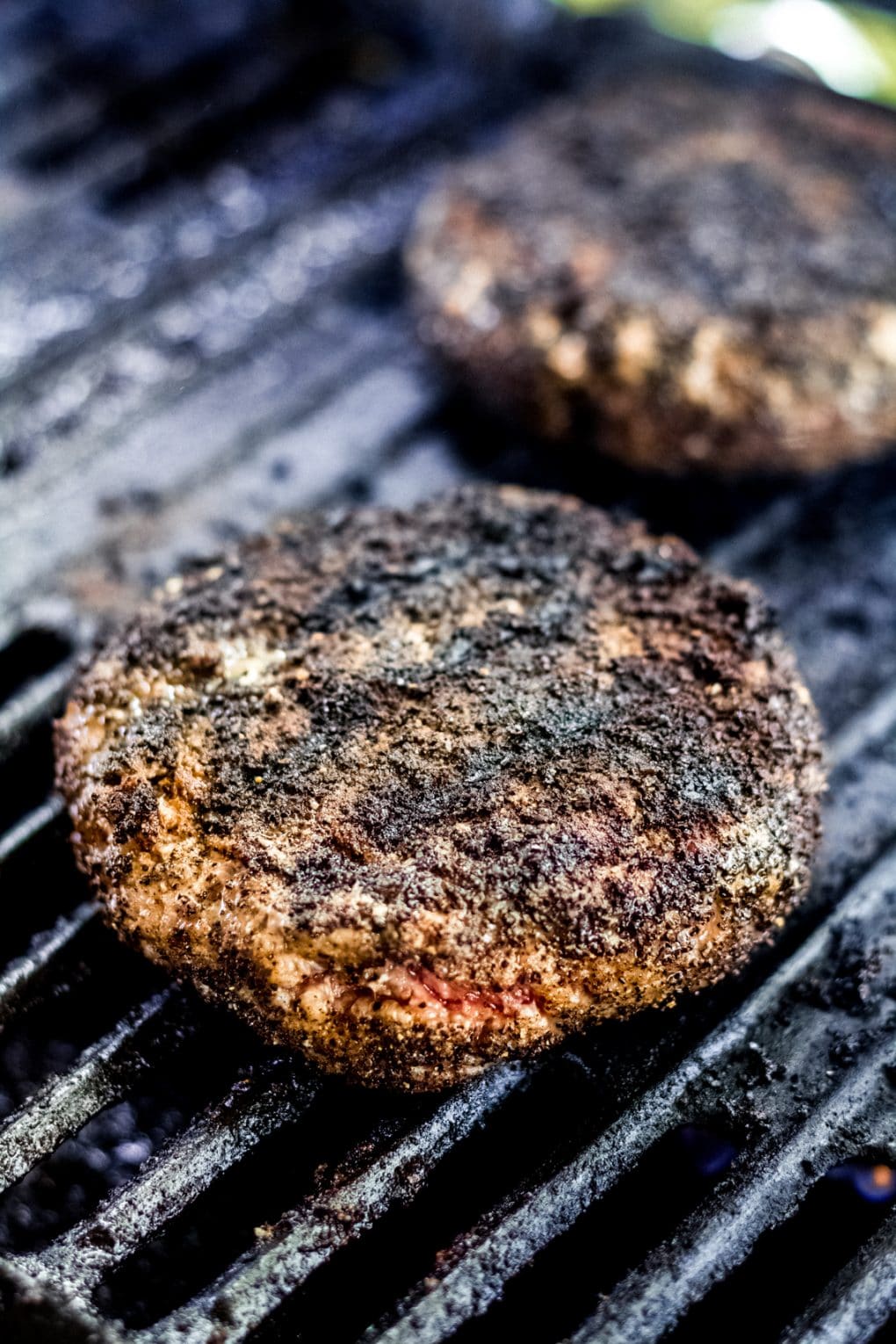 coffee rubbed burgers on a grill