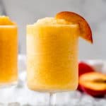two glasses of frozen peach Bellini