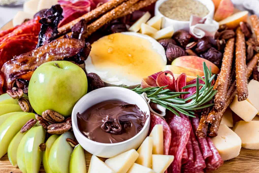 an assortment of items on a fall charcuterie board