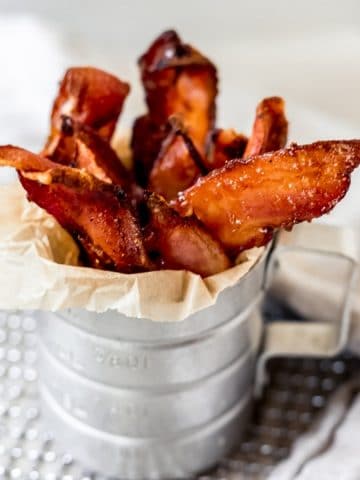 air fried candied bacon in a container