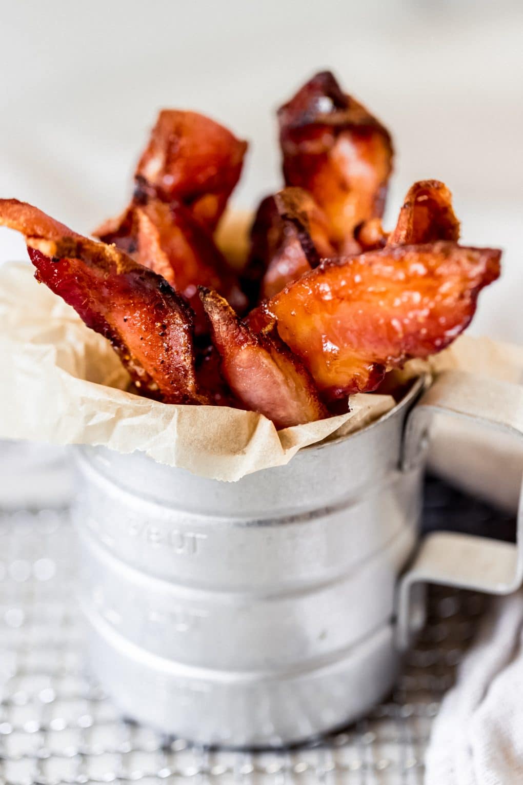 air fried candied bacon in a container