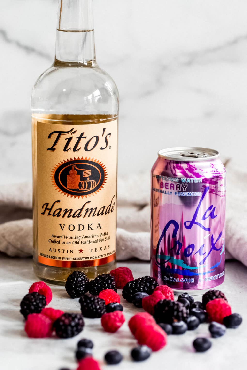 Titos Vodka, Berry La Croix, and Mixed Berries