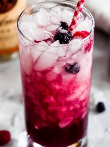 a tall highball glass of berry la croix vodka smash